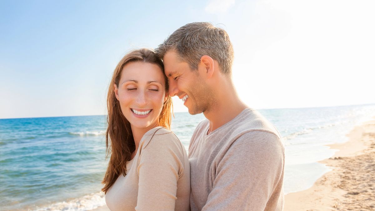 happy couple on the beach