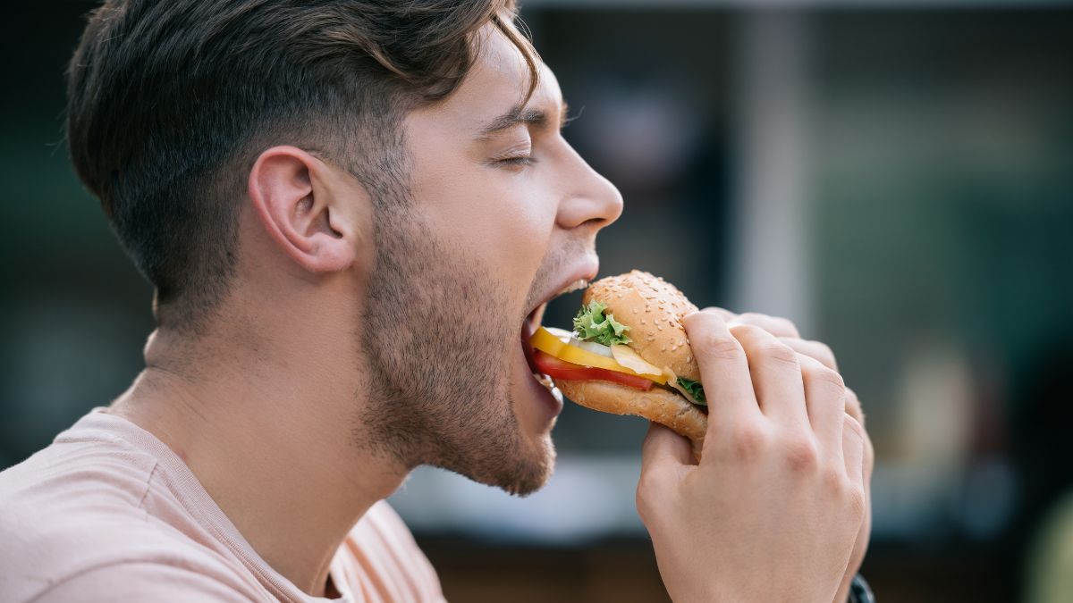 man eating sandwich