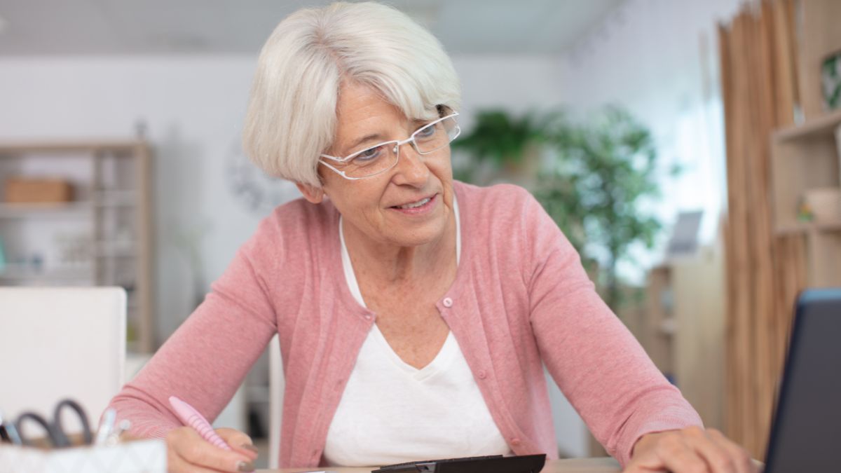 older woman doing budget