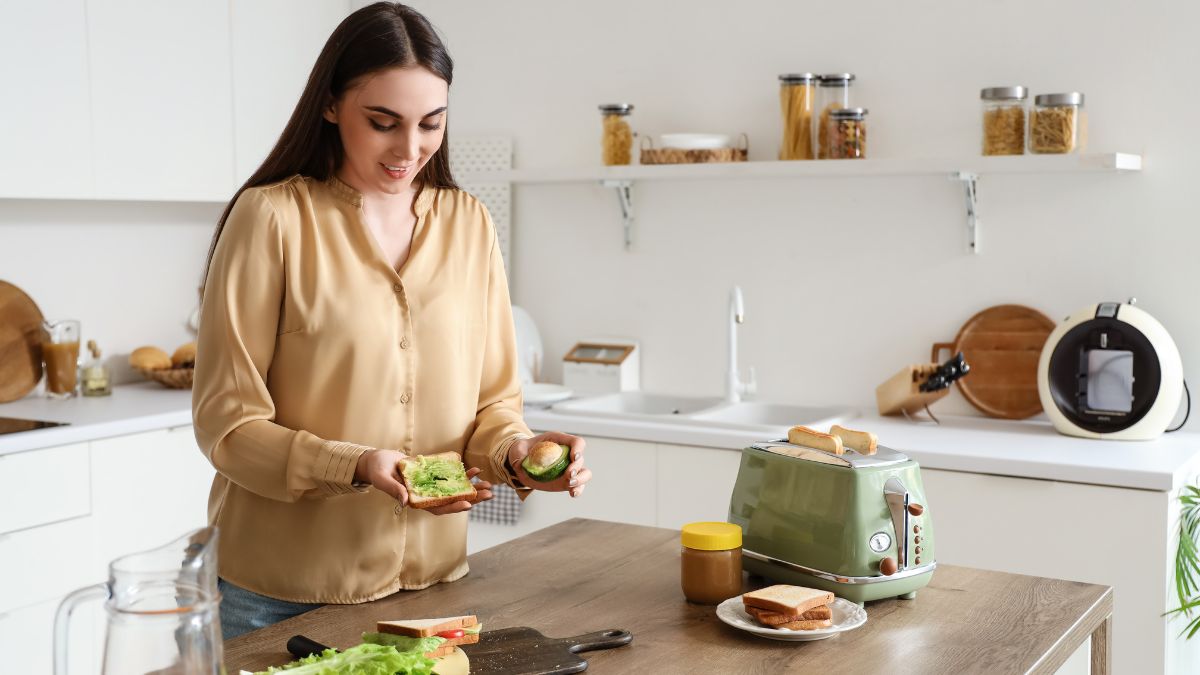 person eating avocado toast