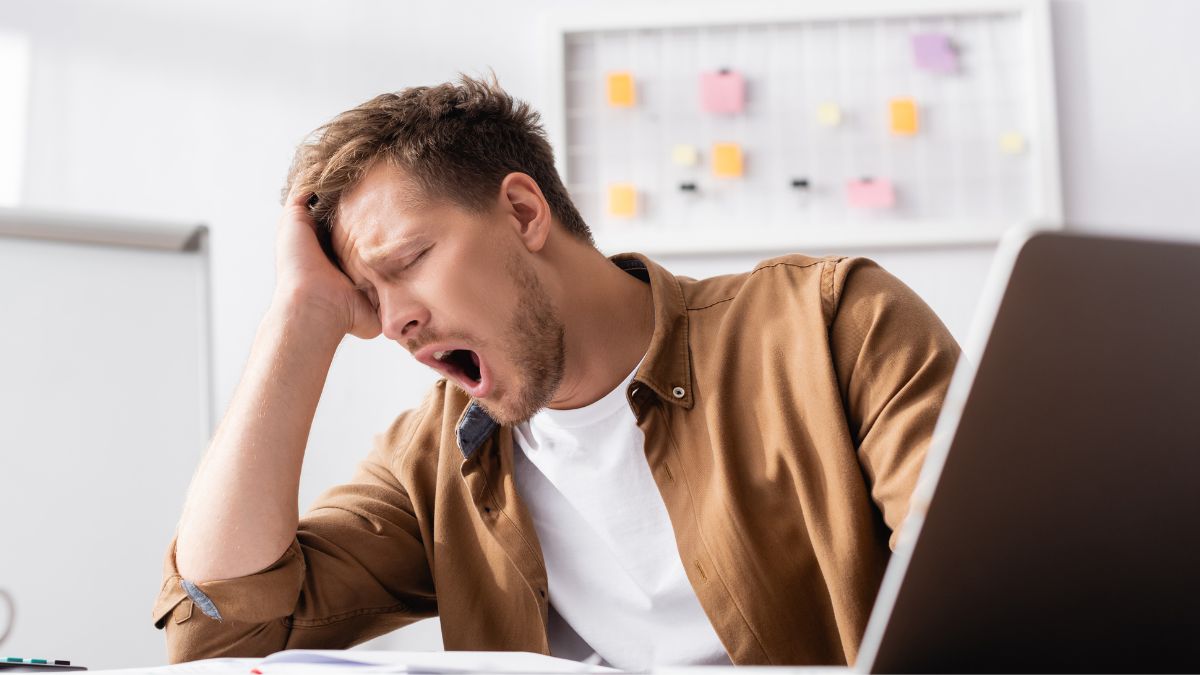 tired man at desk