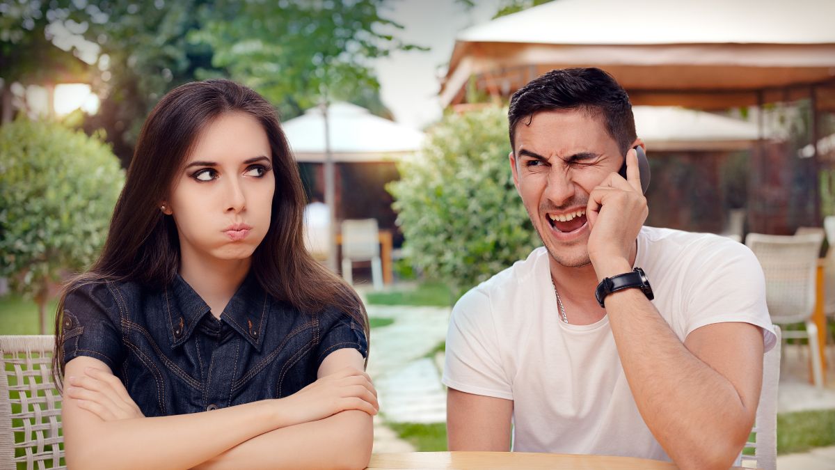 upset woman with man on the phone