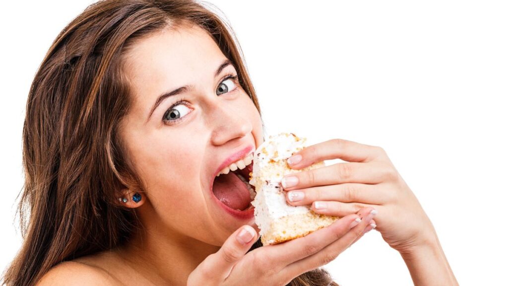 woman eating cake