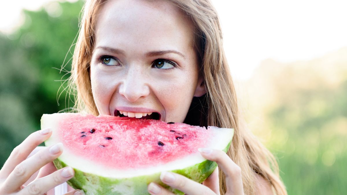 woman eating watermelon