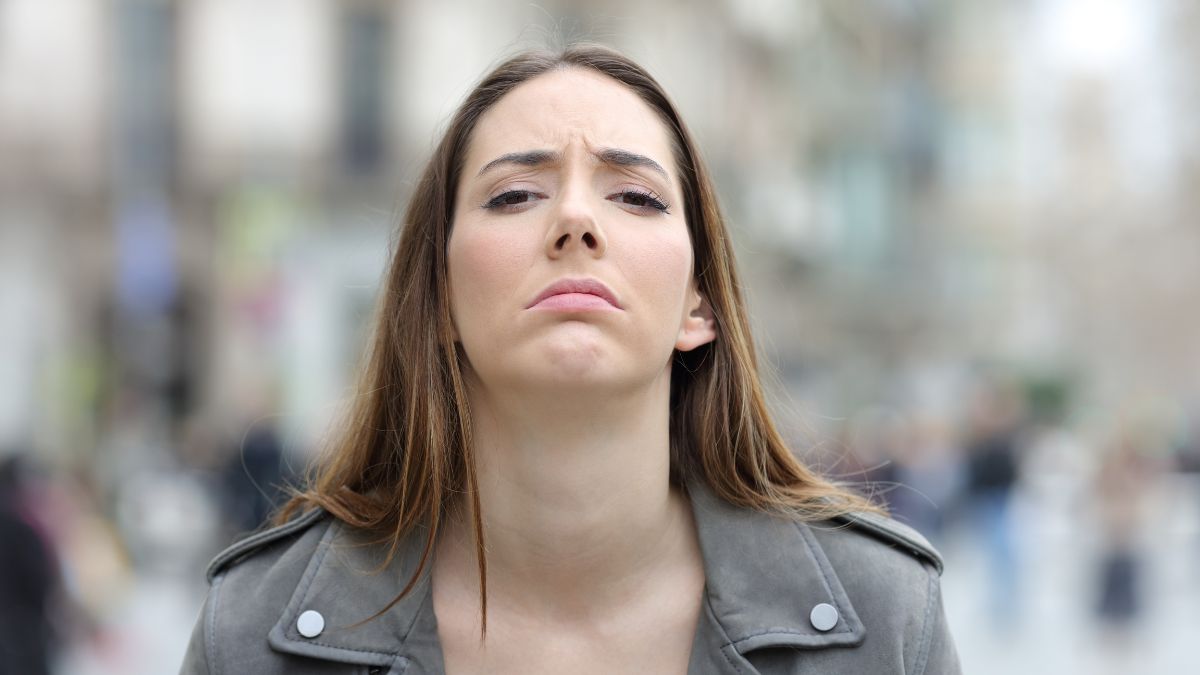 woman looking upset and confused