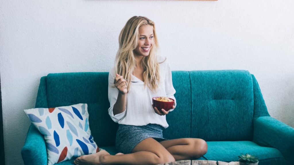 woman sitting on couch