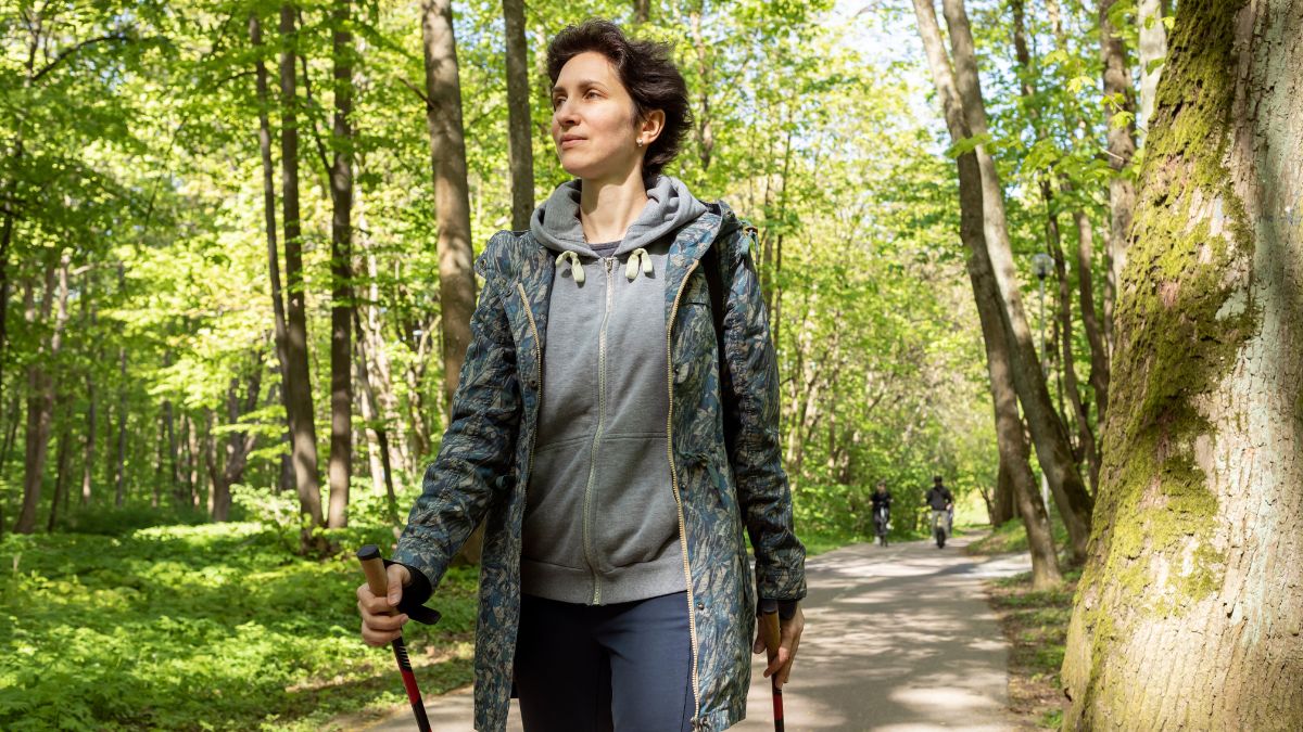 woman walking in the woods