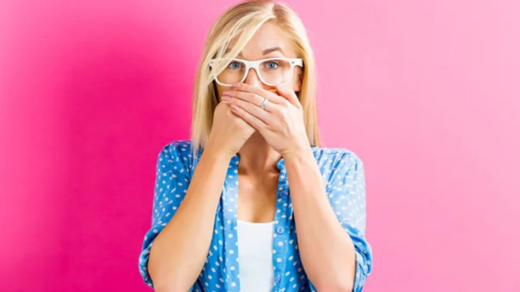 Woman Hands Covering Mouth