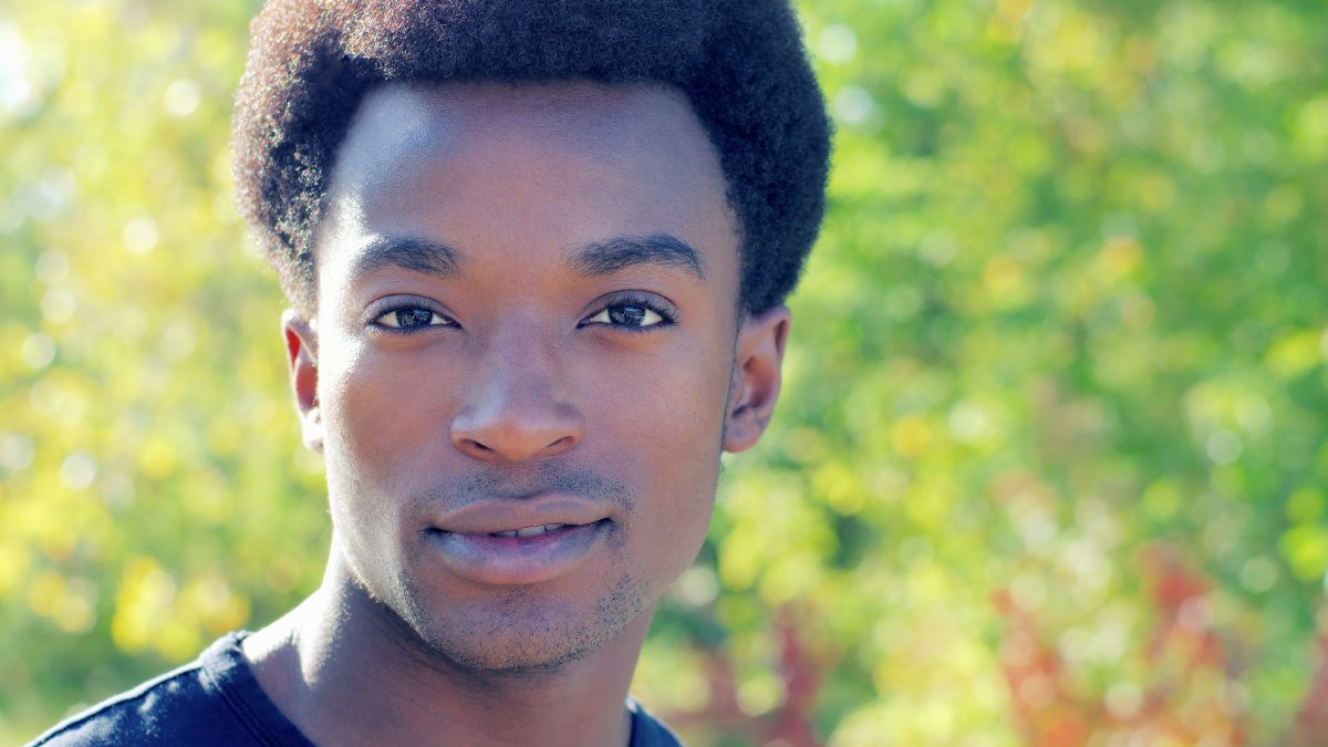 attractive man smiling outside