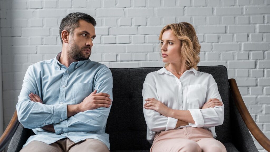 couple looking angry at each other