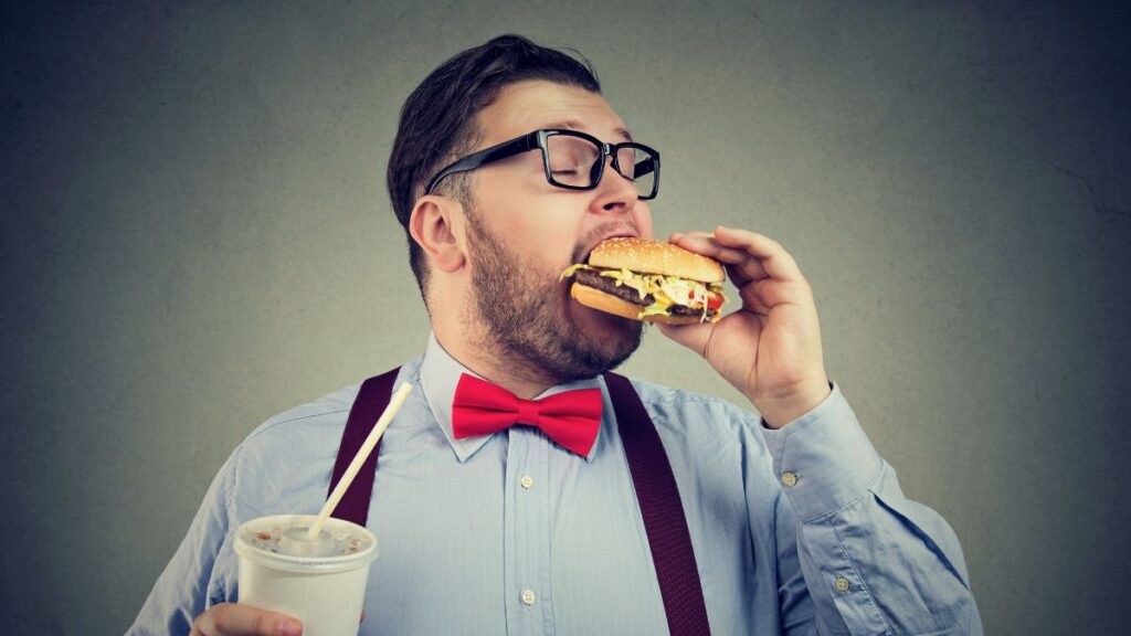 man eating fast food