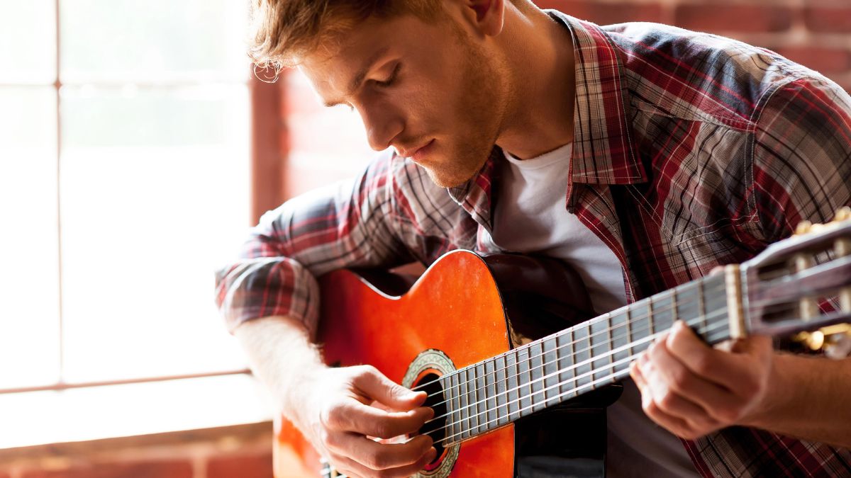 man playing guitar