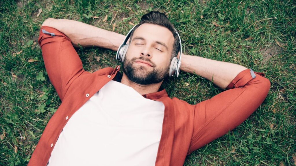 man resting with headphones