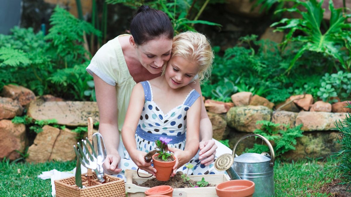 mom and daughter gardening