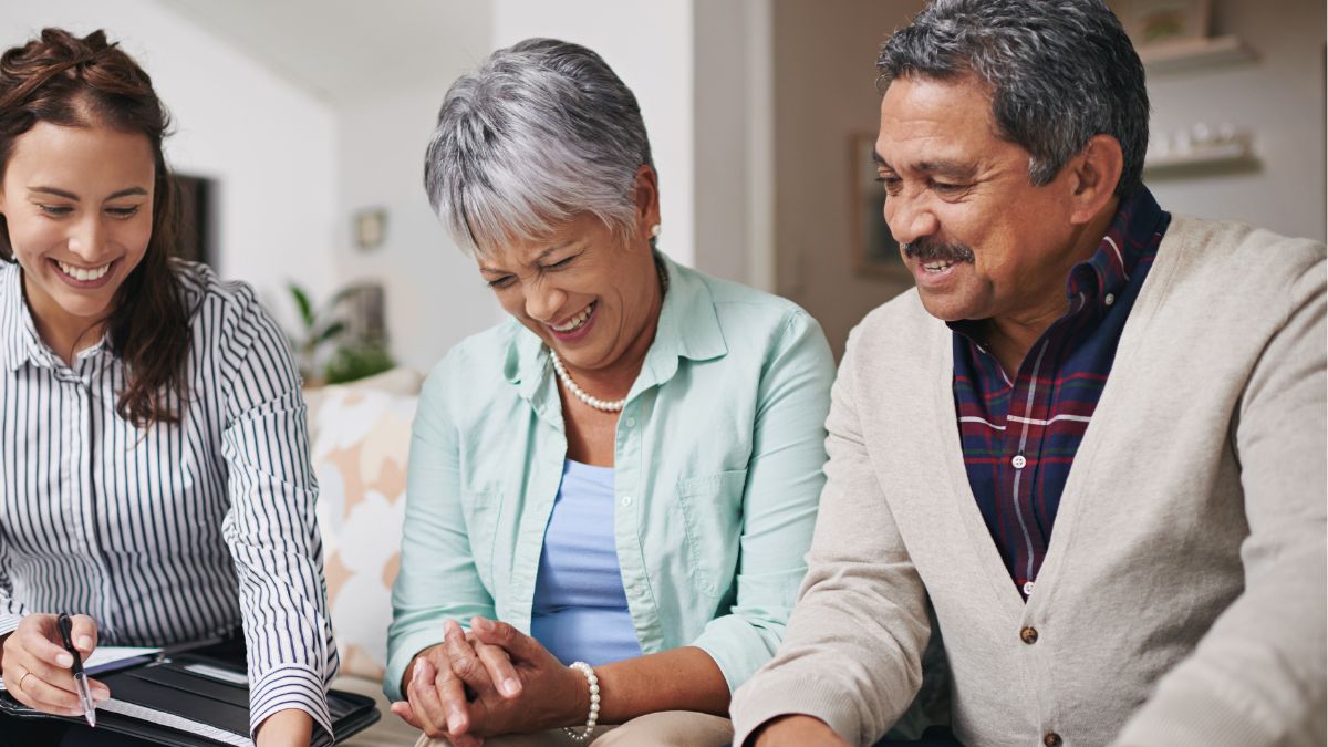 older couple planning money with advisor