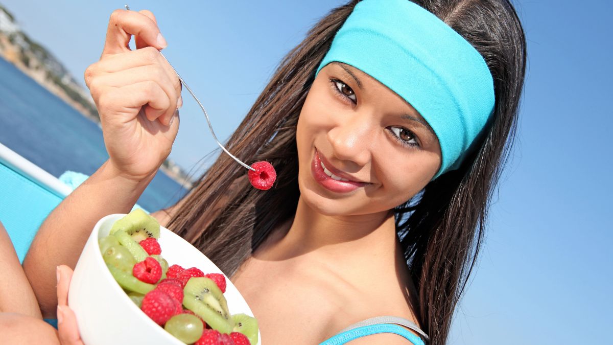 woman eating berries