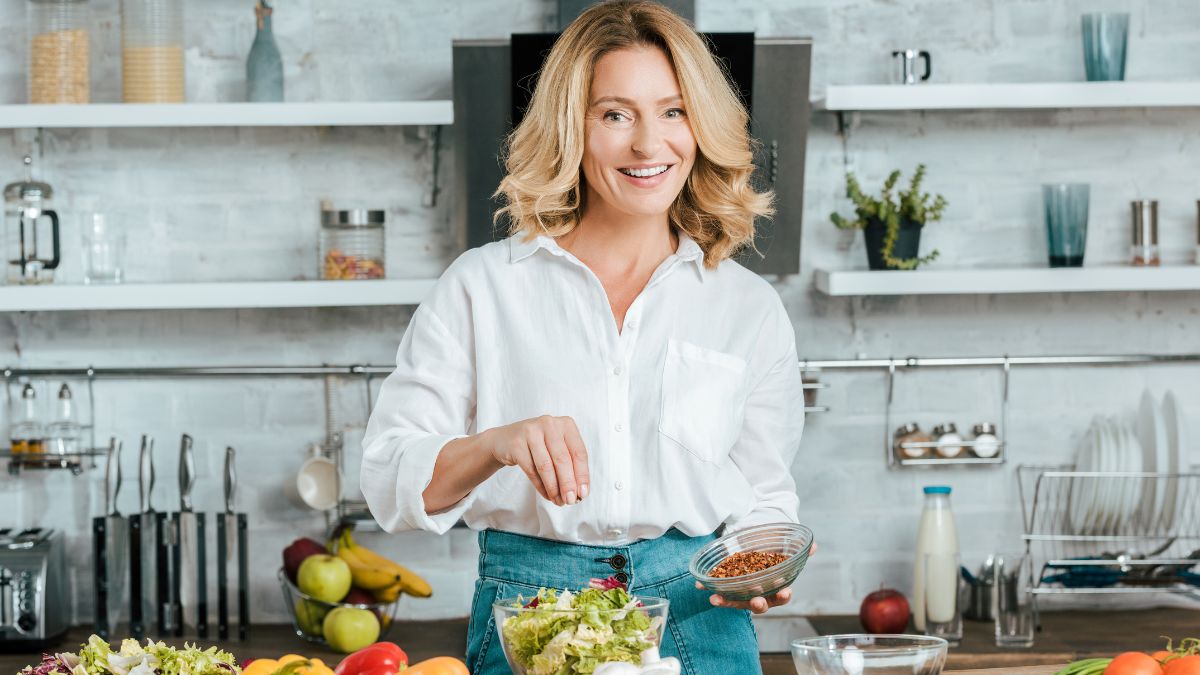 woman making salad