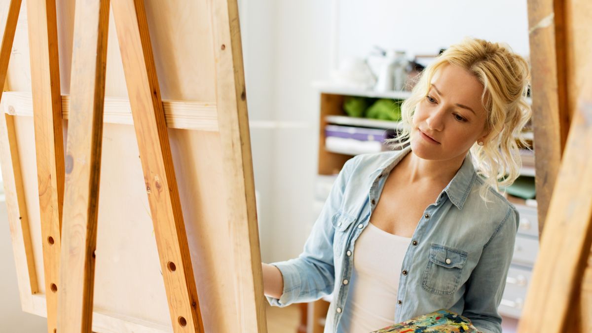 woman painting canvas