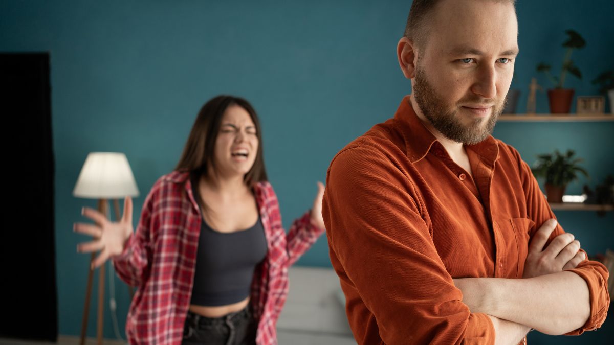 woman screaming man turned away in fight